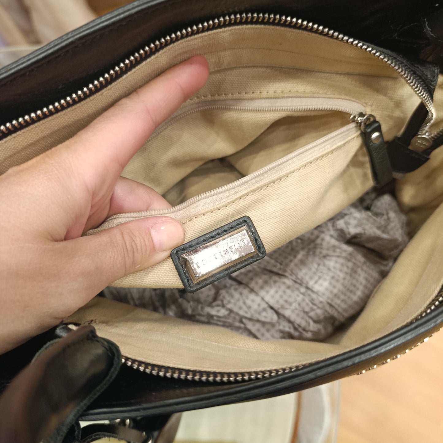 Borsa Coccinelle nera