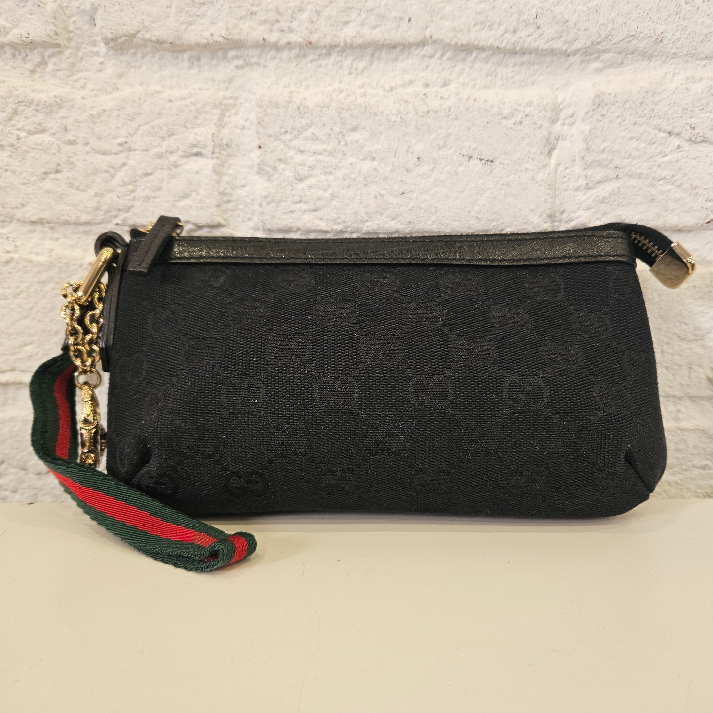 Pochette Gucci in tela