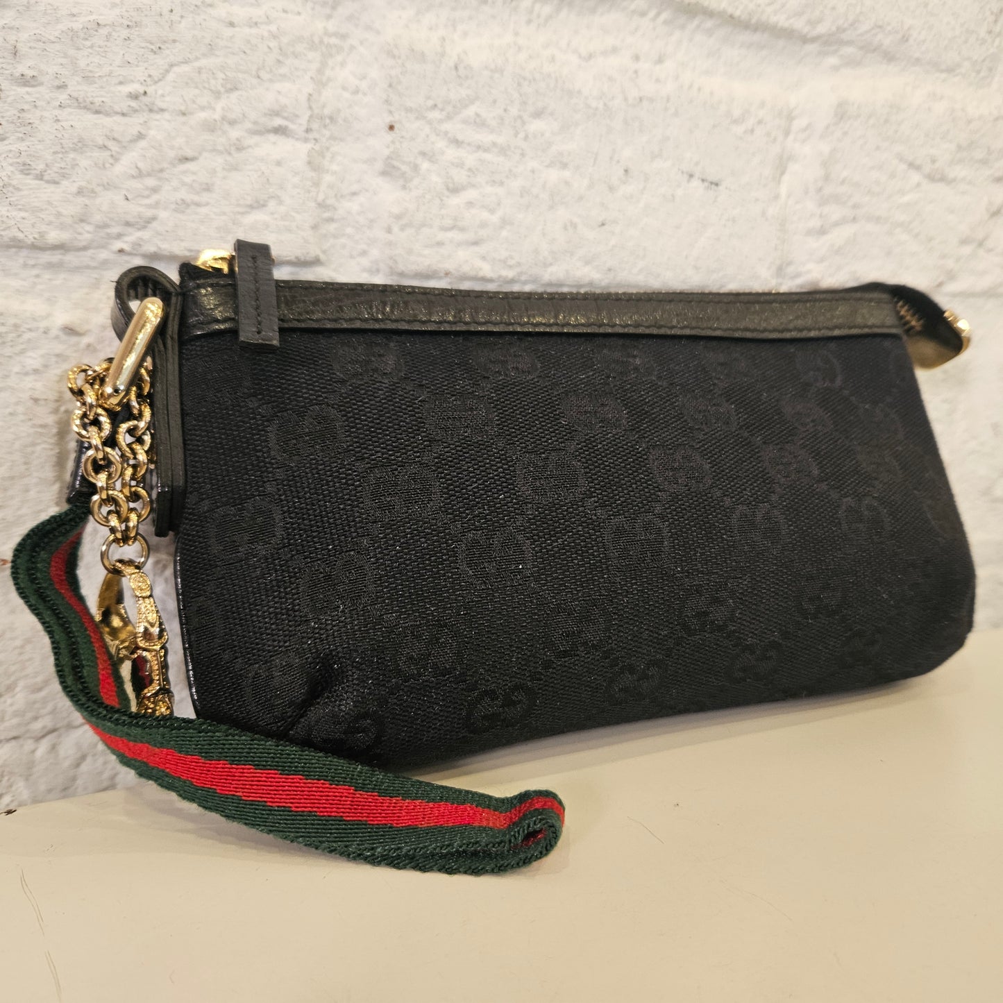 Pochette Gucci in tela