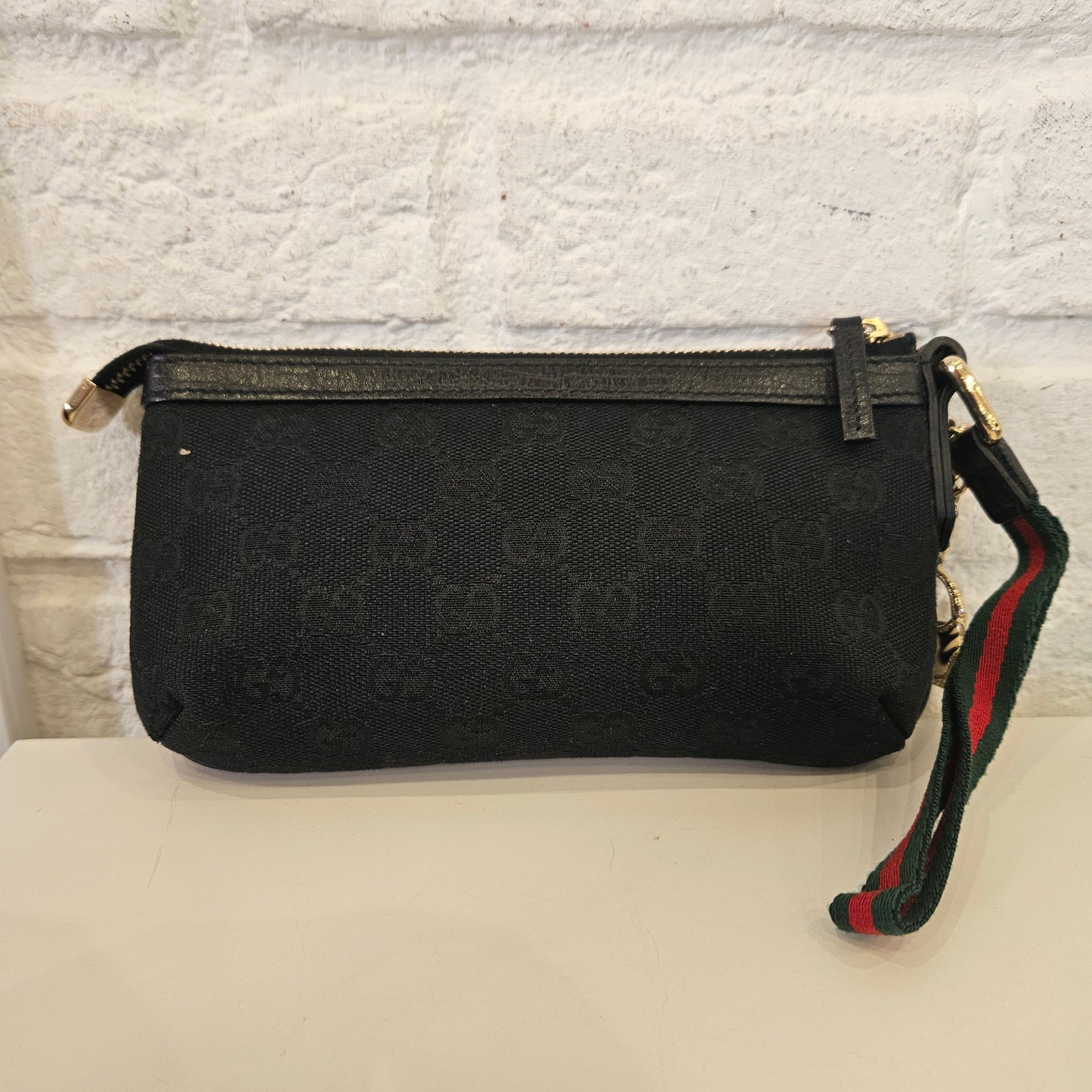 Pochette Gucci in tela