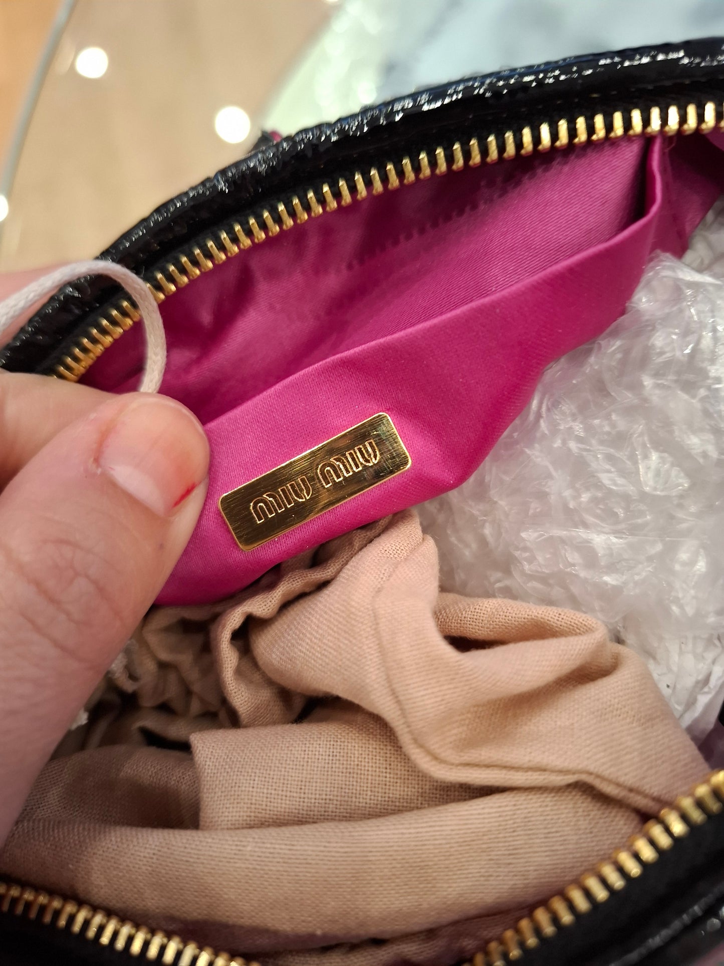 Pochette gioiello Miu Miu