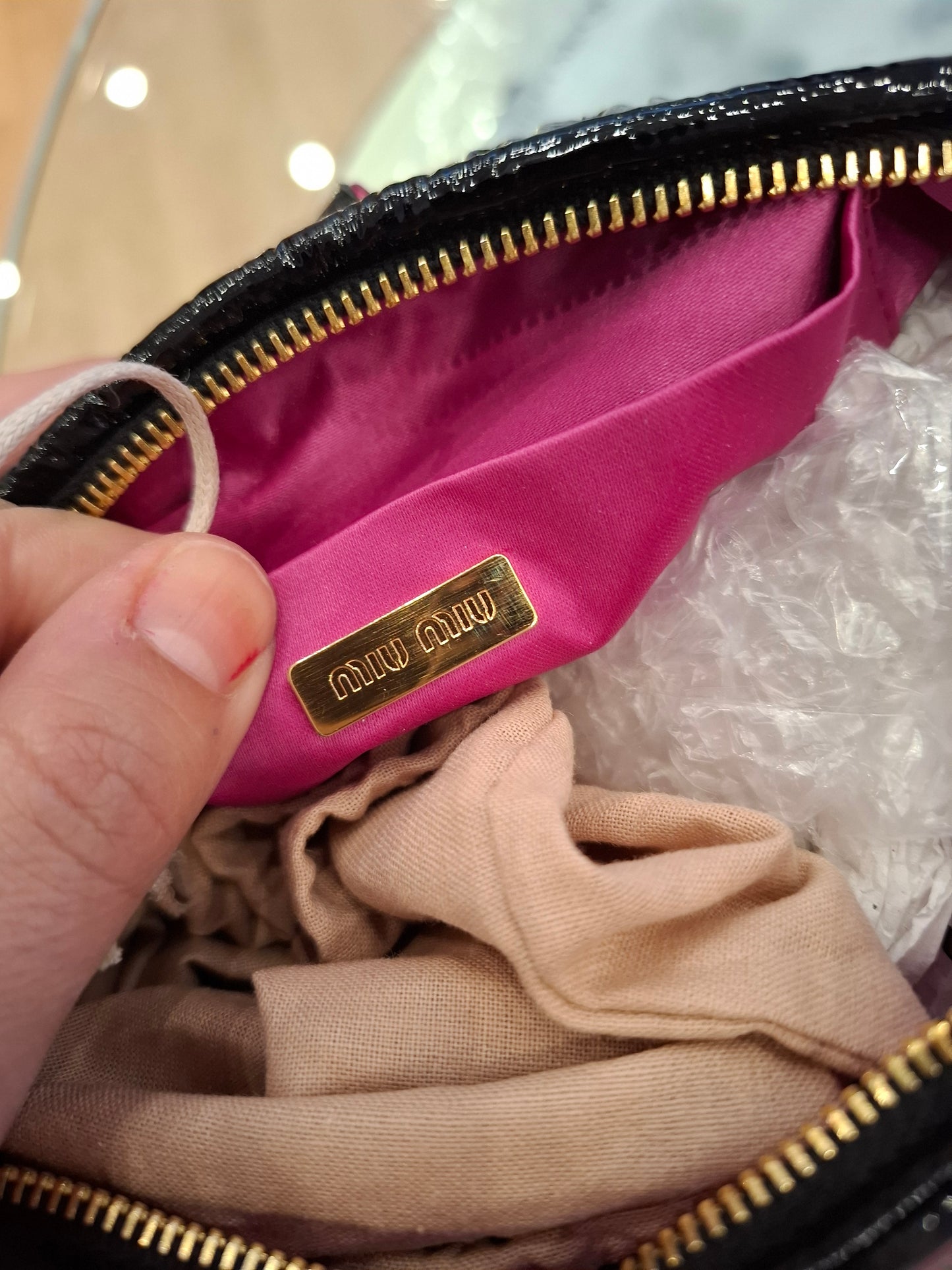 Pochette gioiello Miu Miu