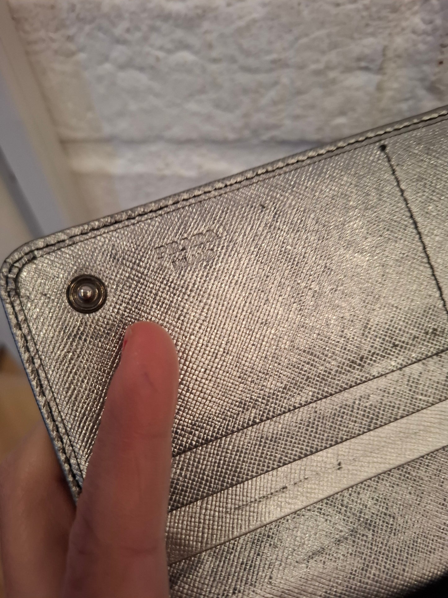 Portafoglio Prada argentato