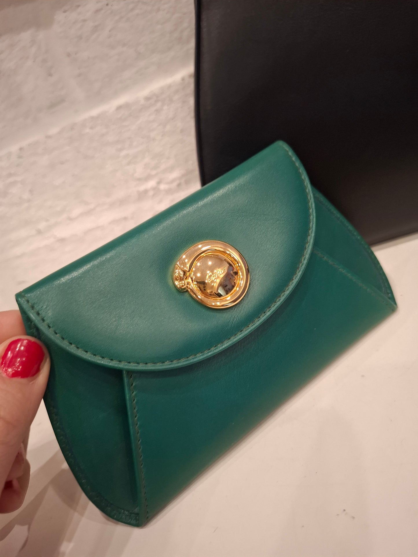 Pochette Cartier nera + portafogli