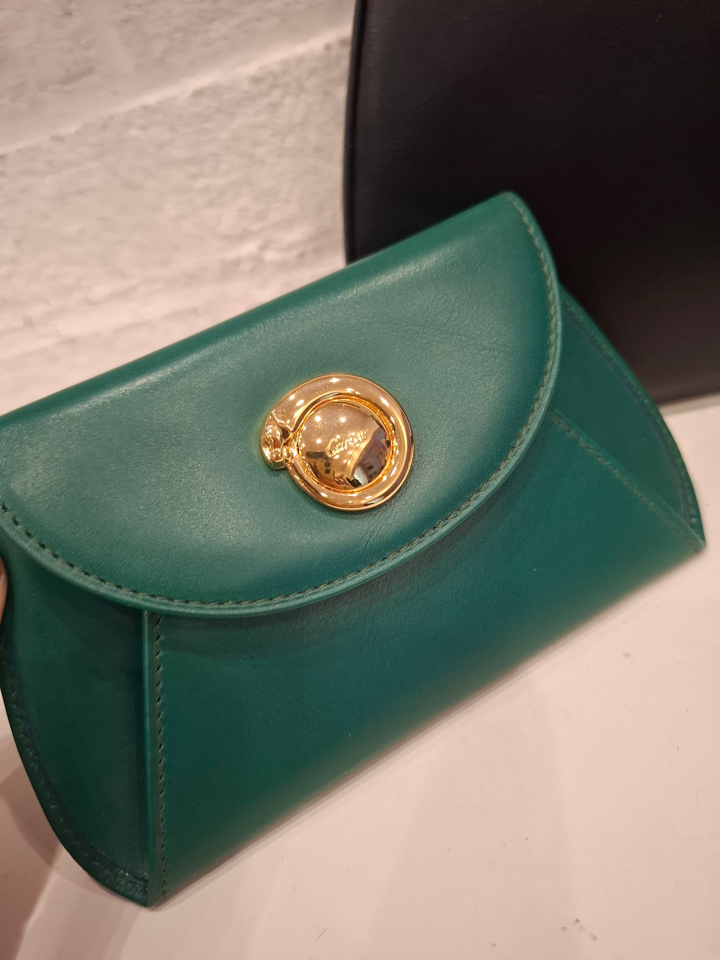 Pochette Cartier nera + portafogli