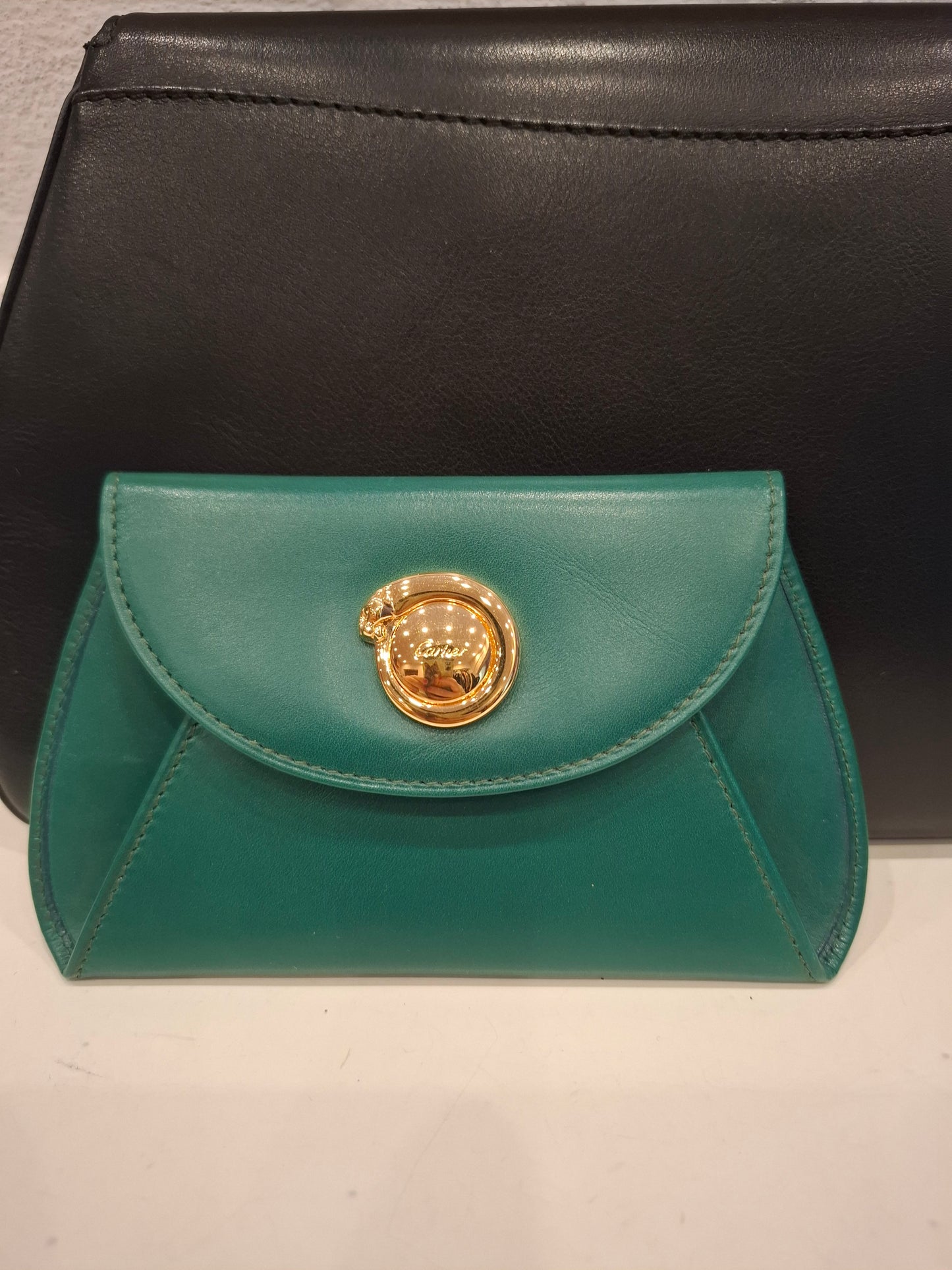 Pochette Cartier nera + portafogli