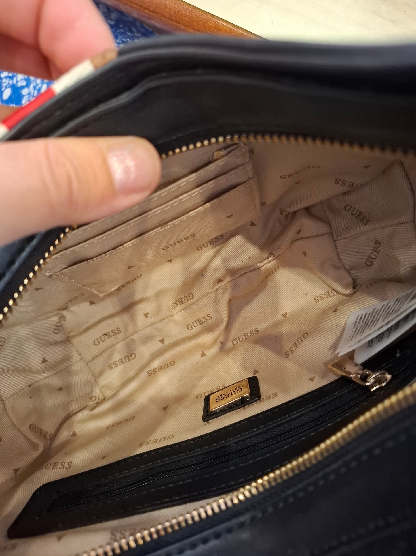 Borsa Guess nera con banda