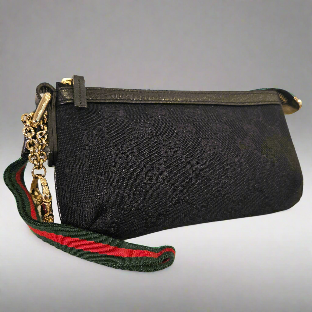 Pochette Gucci in tela